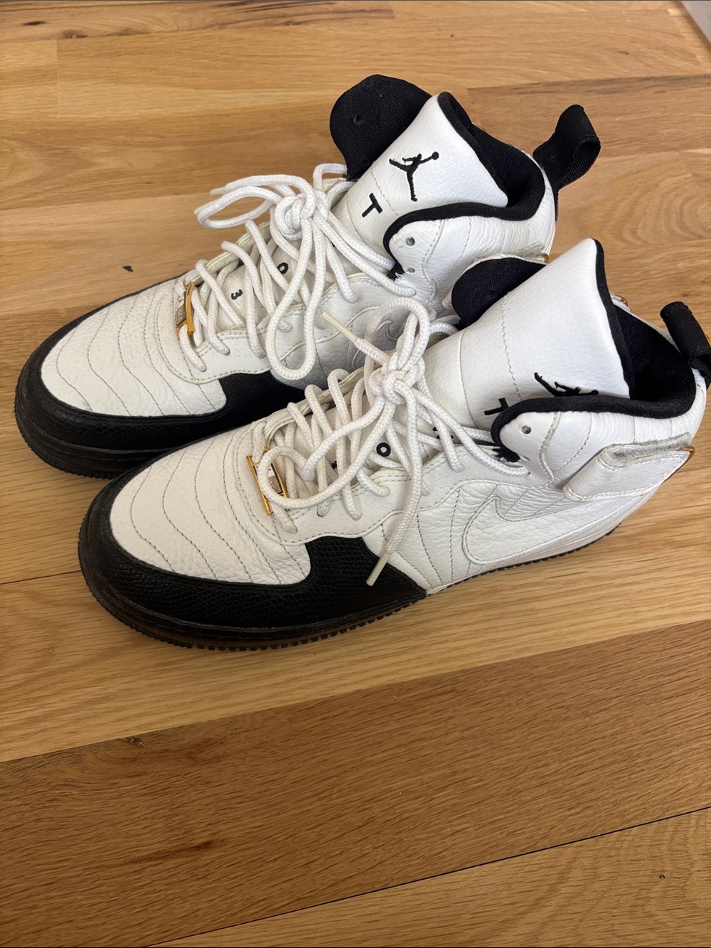 Jordan Force Taxi 12 White and Black High-Top Sneakers 8.5